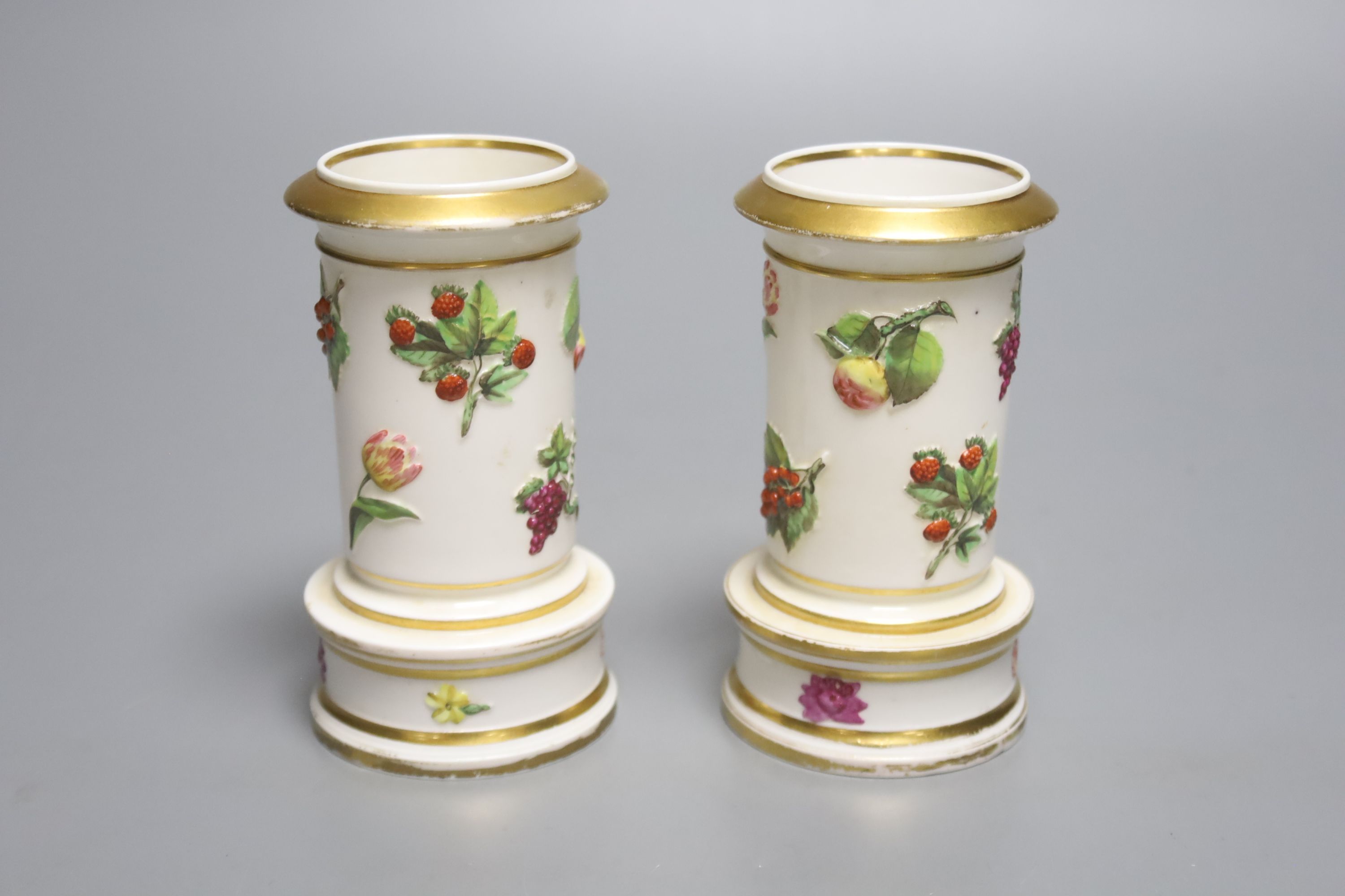 A rare pair of Spode of moulded spill vases the moulding naturally painted, Spode patter 2910, marked in red, height 10.5cm